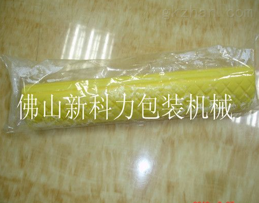 带光电感应长度头胶棉包装机